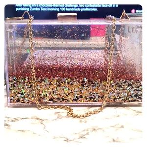 Water gold glitter clutch